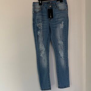 Fashion Nova Light Blue Distressed Skinny Jeans